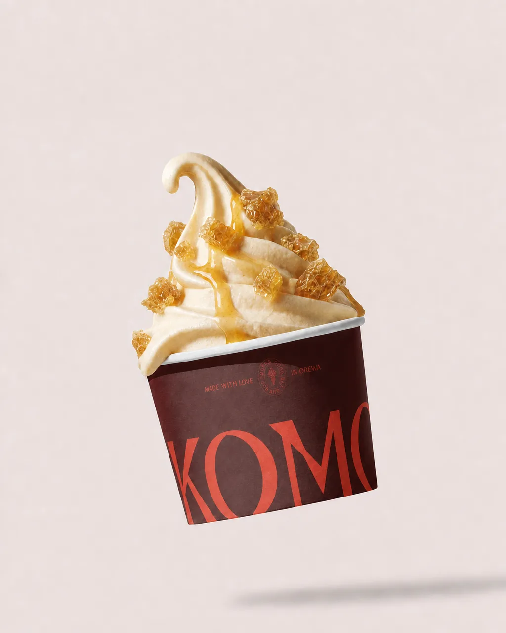 A Komo cup of honeycomb frozen yoghurt